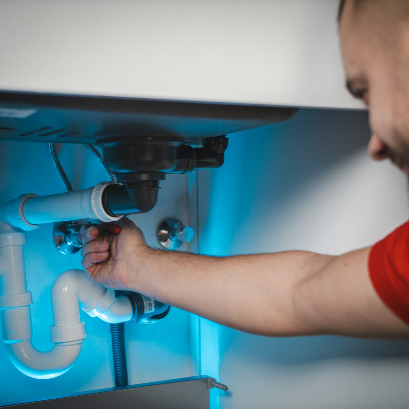 Norfolk Plumbing licensed plumber on a service call in Norfolk, Ontario